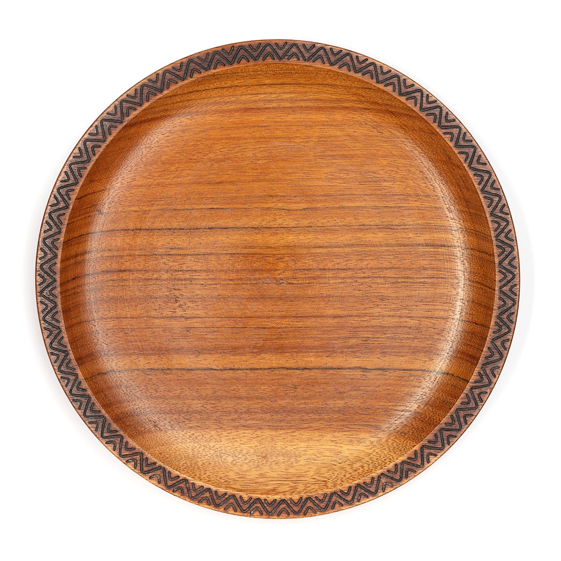 image of an ornamental plate in wood