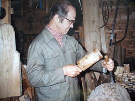 Picture of the artist at work in his studio