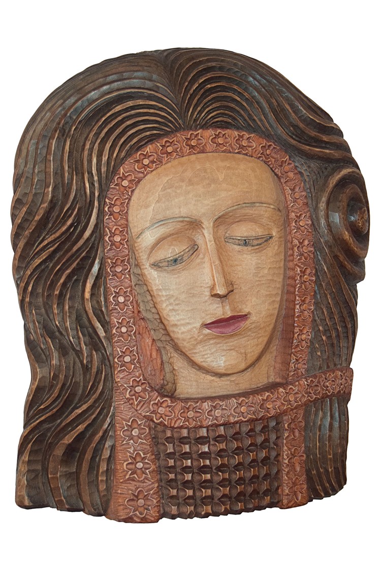 image of a sculpture in wood presenting Madonna