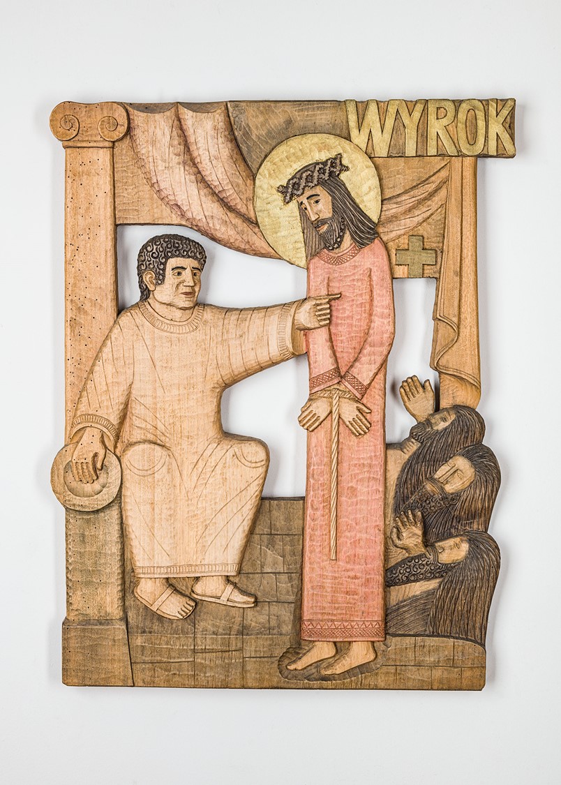 image of a bas relief carved in wood presenting Jesus being condemned to death