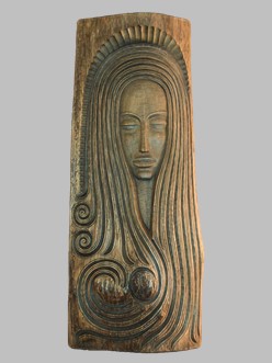 Wooden carving of a woman's head and bust